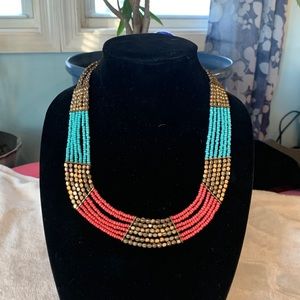 Tan Jorge gold, turquoise, and pink necklace